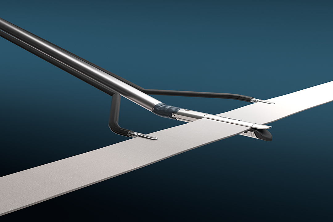 Da Vinci SP stapler in use with other da Vinci SP instruments