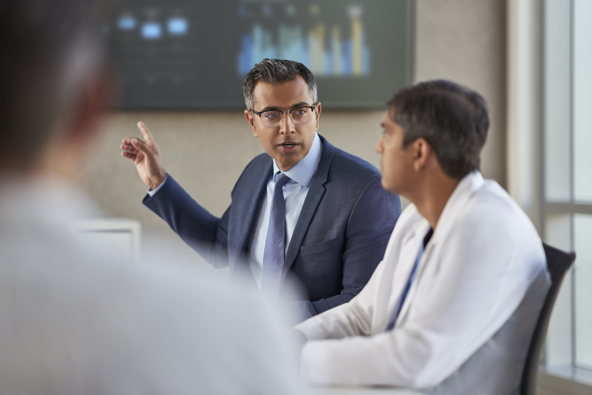 CFO reviewing robotics program data and analysis