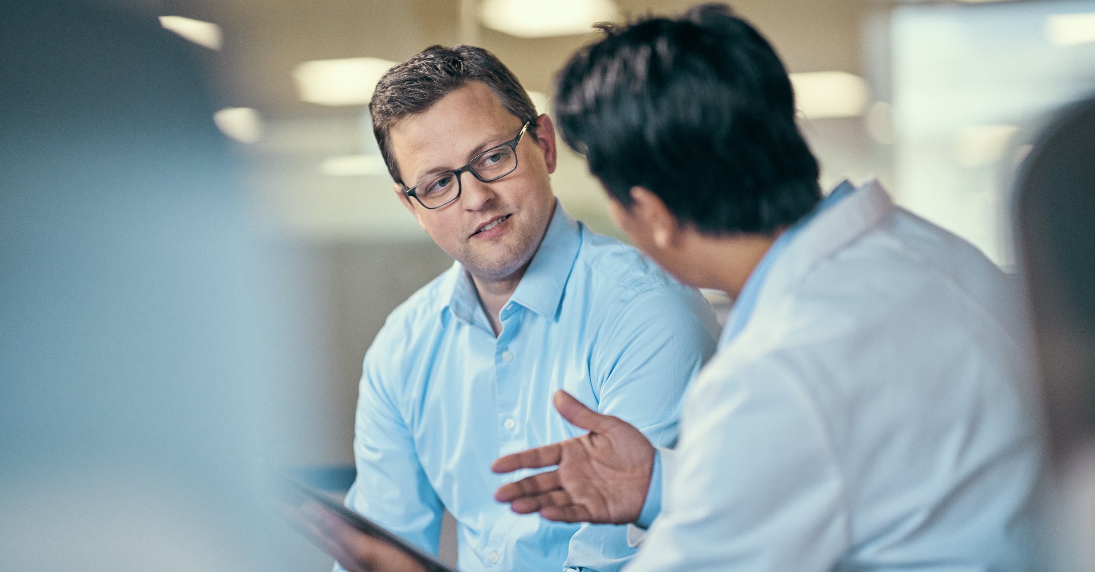 Referring physician consulting patient