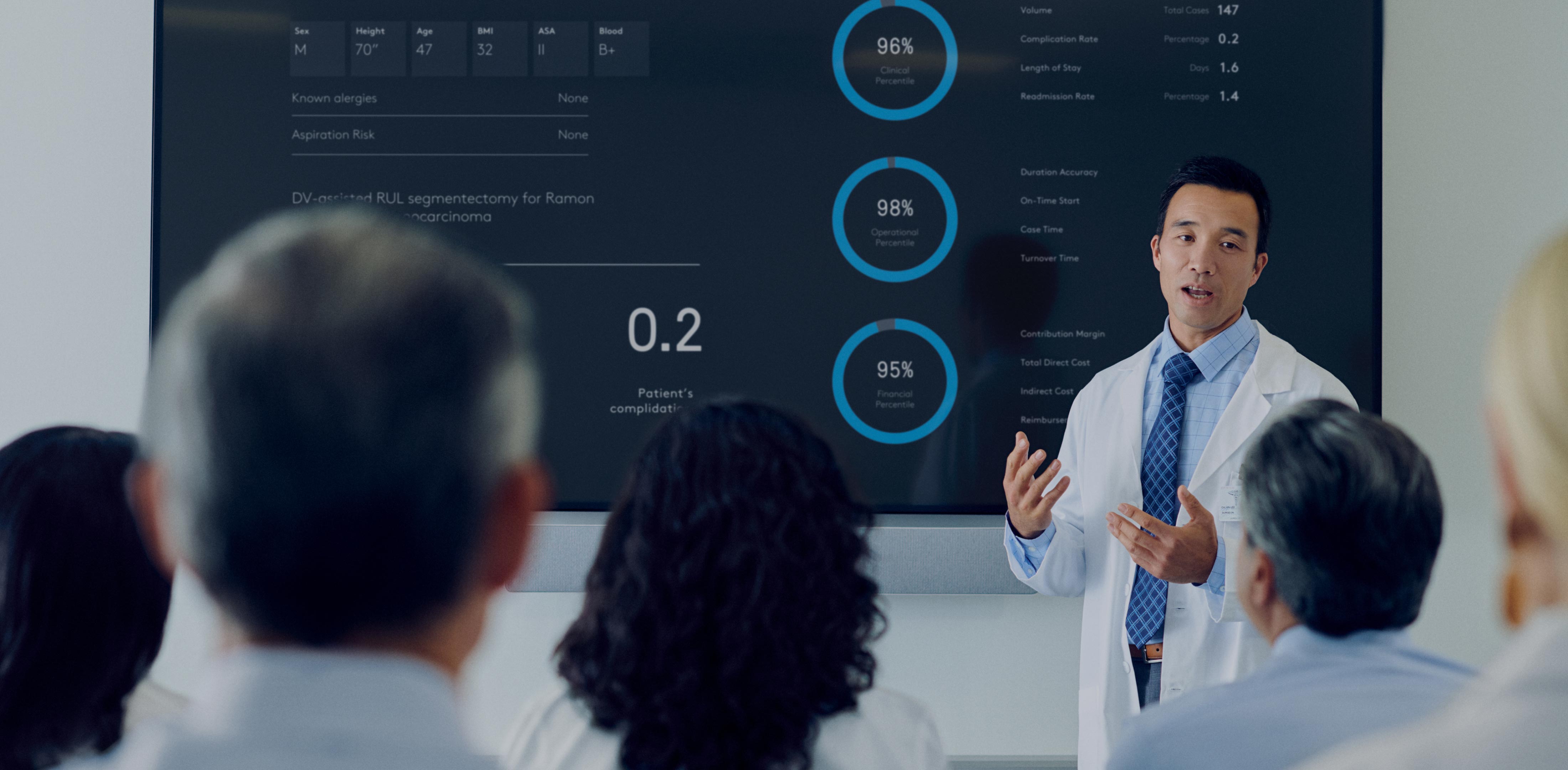 Surgeon presenting value of robotics in residency for SurgeOn Academy