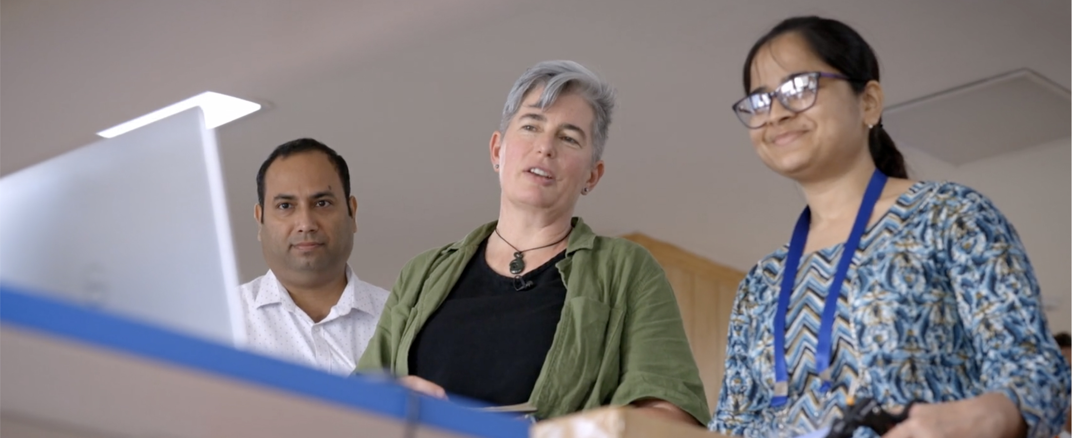 Intuitive Foundation President Dr. Catherine Mohr with two students