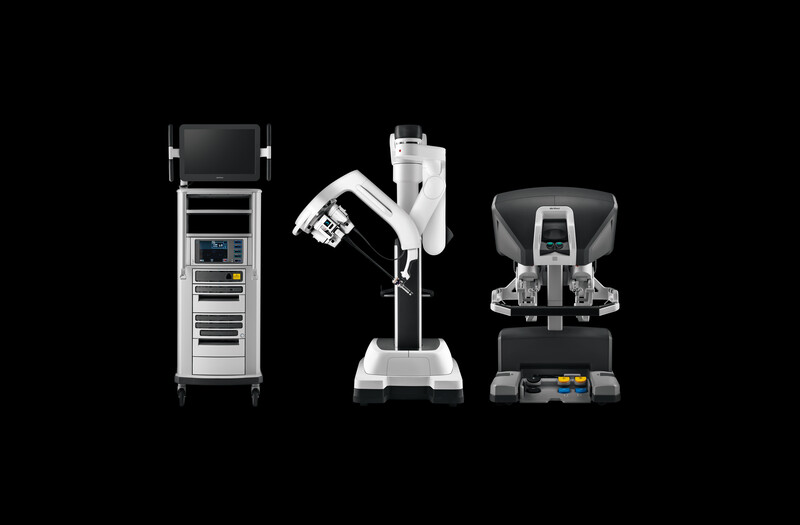 Image of the da Vinci SP vision cart, patient cart, and surgeon console