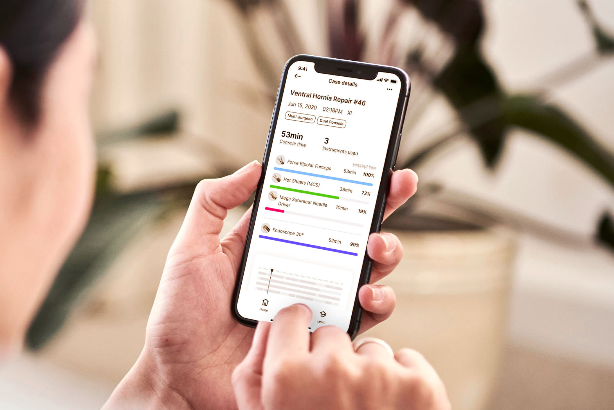 The My Intuitive app on a phone in hand