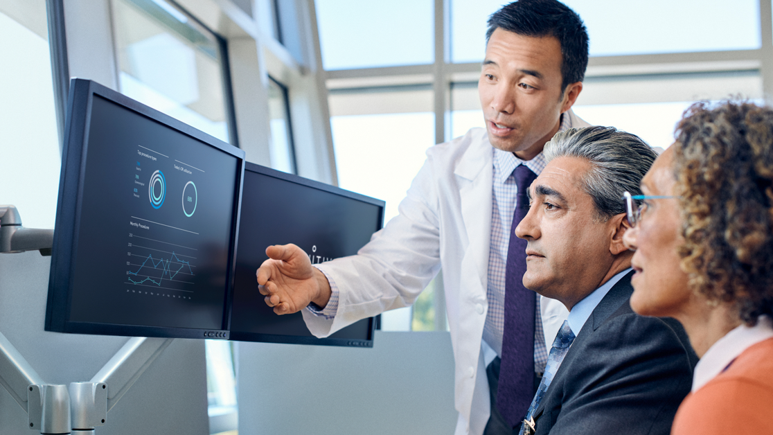 Instructor pointing out data on a screen